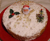 Vassilopita - Greek New Year's Cake with powdered sugar