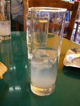 A simple glass of ouzo at an ouzeria in Greece.