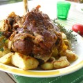 Pot roasted leg of lamb with garlic and cheese